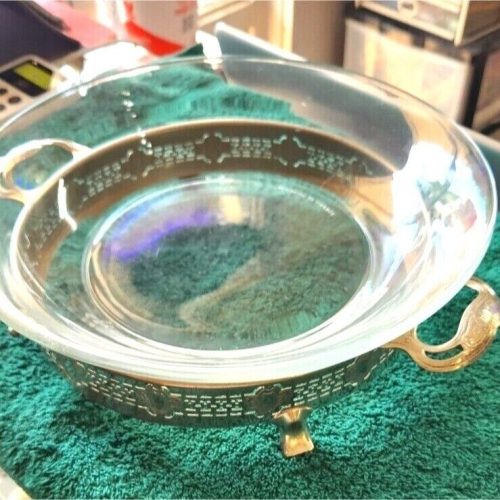 Arcoroc 14-inch France baking dish in silver-plated footed holder.