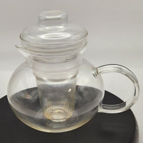 Clear borosilicate glass teapot with infuser and 40 oz set for tea brewing.