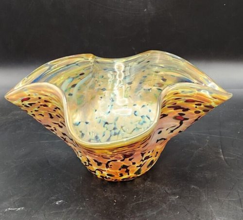 Handcrafted blown art glass in white, orange, and yellow with a molten finish.