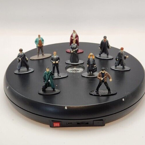 Ten Harry Potter cast metal and enamel collectible figurines set.
