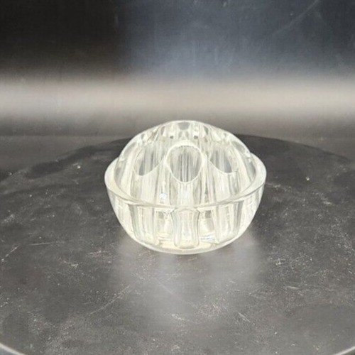 Clear art glass flower frog pen and pencil holder for stationary organization.