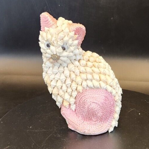 Pink and white seashell kitten figurine for collectible home decor.