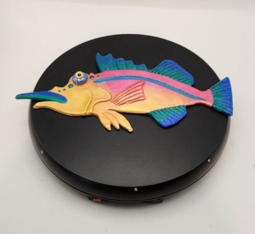 Repaired tail on a colorful marlin fish for conservation.