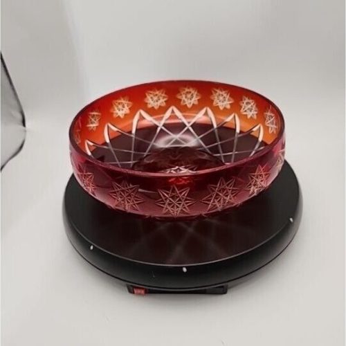 Ruby red cut-to-clear serving bowl with 8-point star patterns.