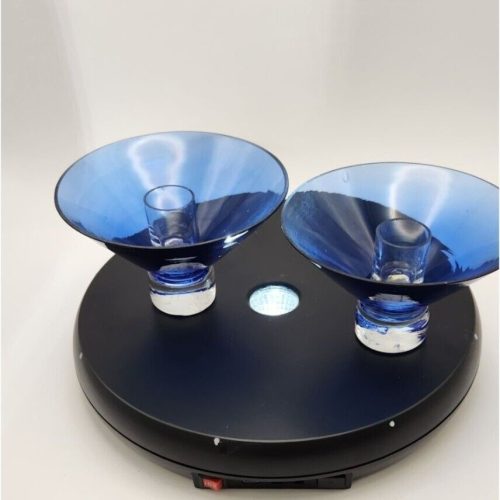 Set of 2 cobalt and clear taper candle holders for elegant home decor.