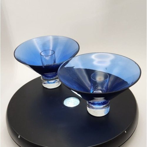 Set of 2 cobalt and clear taper candle stick holders for elegant decor.
