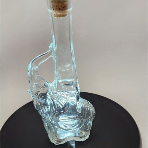 Vintage 1970s Italian elephant-shaped wine bottle with cork stopper.