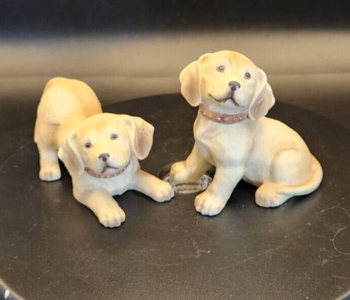 Vintage Homco porcelain golden Labrador puppy figurines, collectible dog sculptures for home decor.