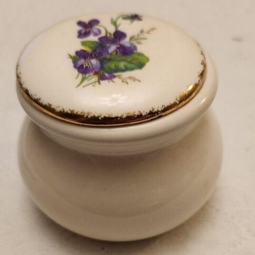 Vintage purple floral ceramic trinket box with gold trim.