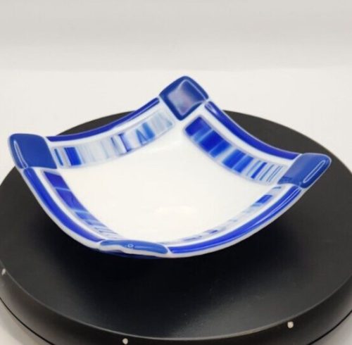 Blue bordered 5.75-inch fused glass square dish for serving and decor.