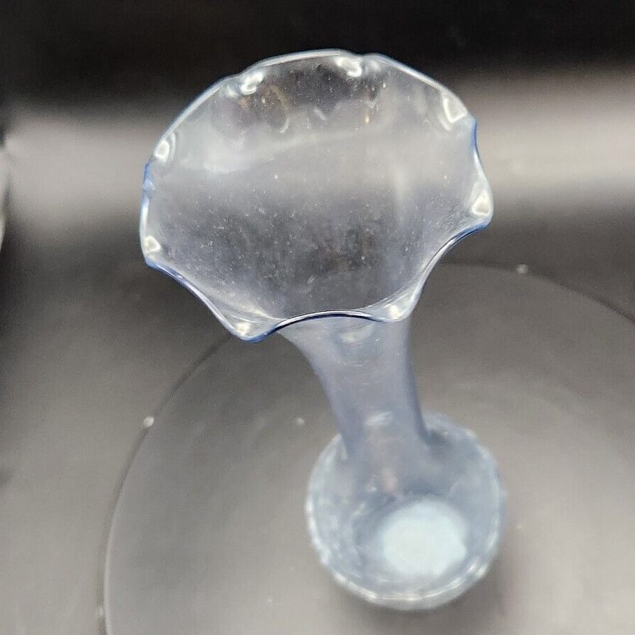 Blue wave crackle glass bud vase for decorative home accents.