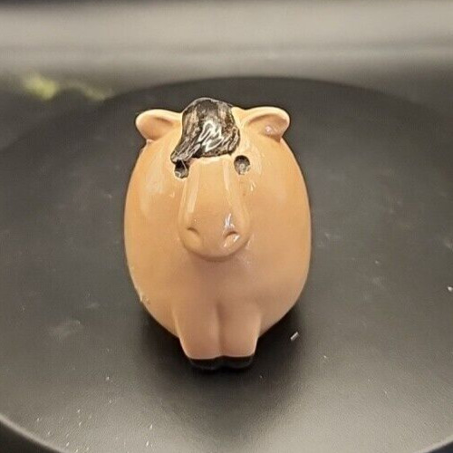 Cute derpy ceramic horse figurine for home decor and collectible gifts.