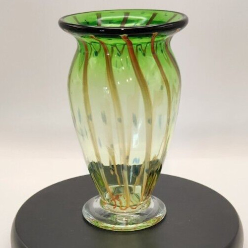 Green and amber blown glass vase for decorative home decor.