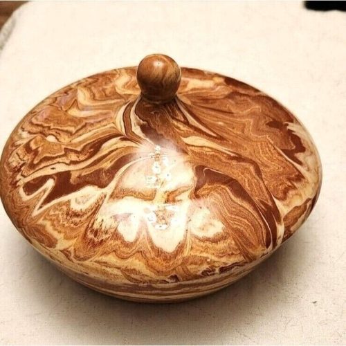 Emil Cahoy Colome handcrafted swirled pottery artwork in South Dakota.