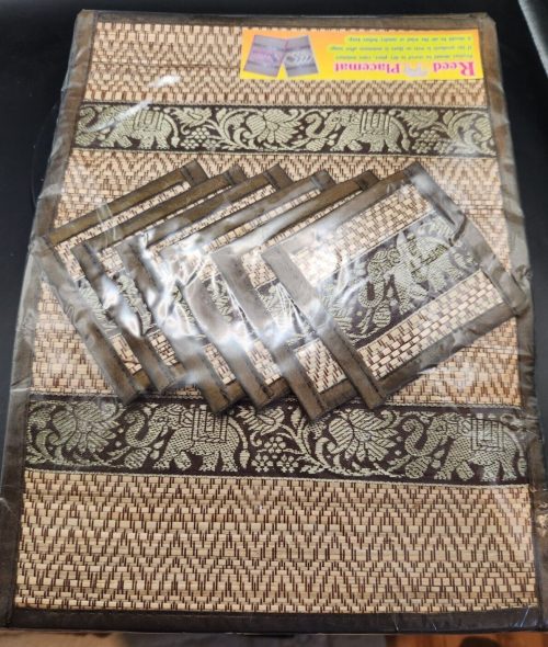 Set of 6 handmade reed placemats, 14.25×10.75 inches, perfect for dining table decor.
