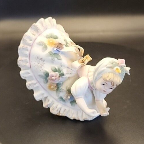 Hand-painted Lefton Blue Bloomers porcelain figurine for collection and decorative display.