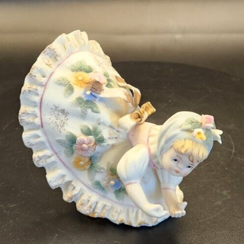 Hand-painted Lefton Blue Bloomers porcelain figurine with floral details.