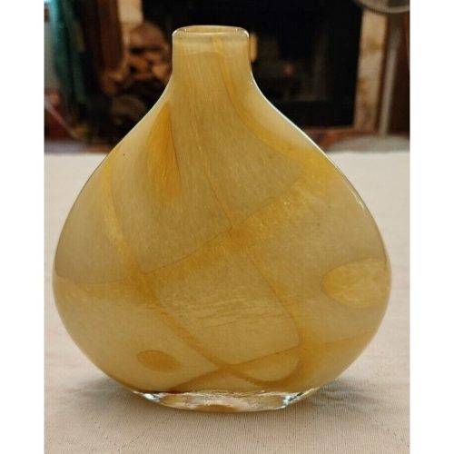 Elegant mid-century modern glass vase with earthy swirls for boho home decor.