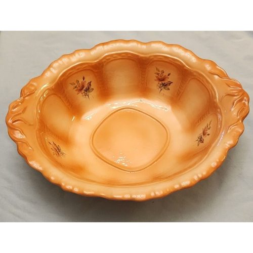 Peach 12-inch porcelain oval serving bowl with floral design for salads and dining.