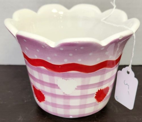 Decorative planter with purple and red hearts for home decor or gift ideas.