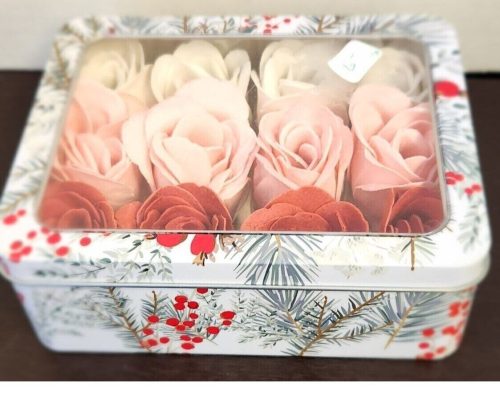 White, red, and pink soap rose bath bombs as gift set for relaxation and aromatherapy.