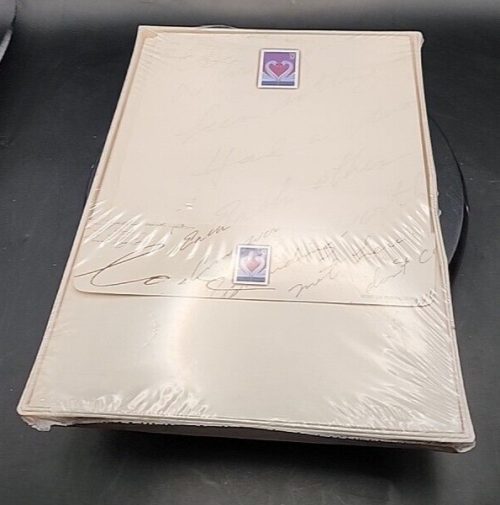 Swans stationery set with 24 sheets and 12 envelopes for elegant letter writing.