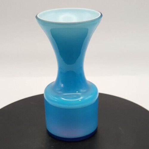1960 German blue glass vase with white opalescent interior for decorative collectible display.