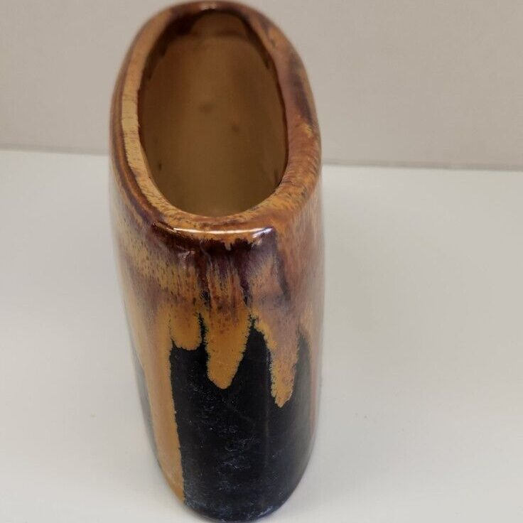 Brown and black drip glazed spring planter numbered 315.