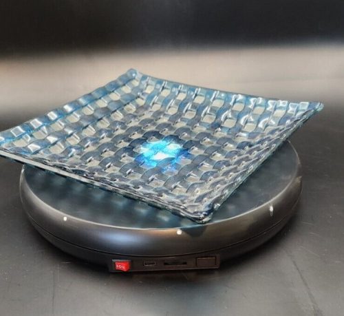 Fused glass decorative plate with woven pattern, 8.5 inches diameter, Handmade art piece.