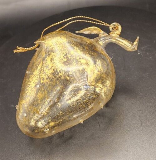 Gold glitter glass strawberry ornament, 5 inches by 3 inches, holiday or Christmas decoration.