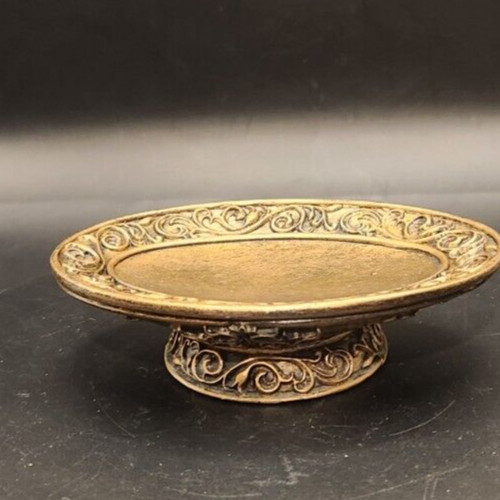 Gold ornate pedestal soap dish with intricate detailing and elegant design.