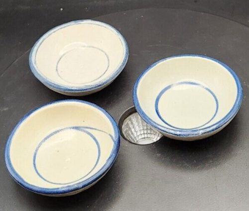 Set of 3 gray and blue stoneware tea bag rests for kitchen decor.