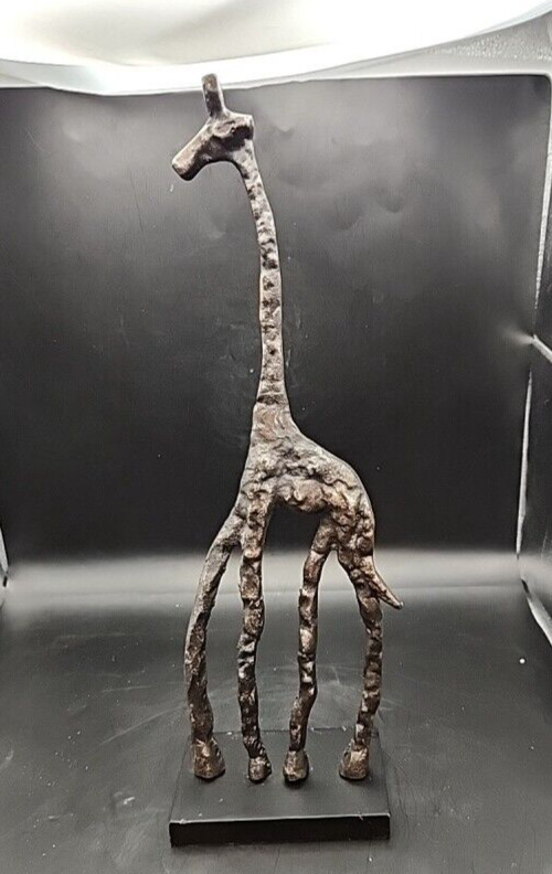 Handcrafted hammered metal giraffe sculpture, 17-inch art statue for home decor.