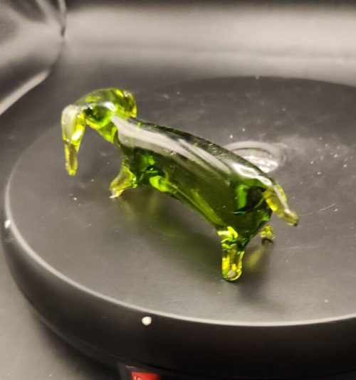 Hand-blown green glass dachshund figurine, 5-inch art dog sculpture for collectors.