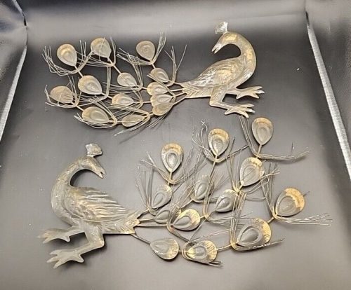 Japanese metal peacock wall decor for elegant home decoration.