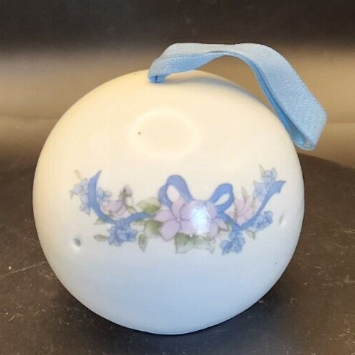 Handmade Takahashi ceramic hanging potpourri holder for home decor and aromatic display.