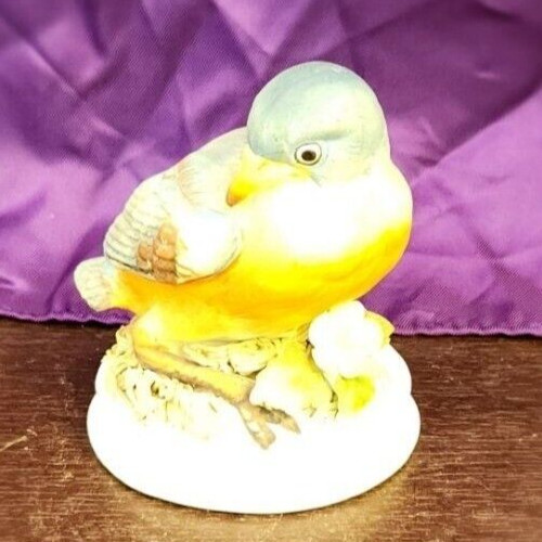 Vintage Lefton China blue bird figurine with hand-painted wildlife design.