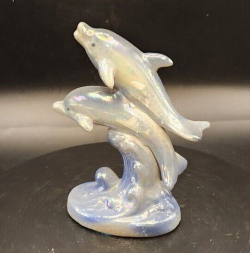 White iridescent dolphin figurine for home decor and collectible display.