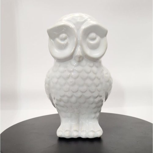 White porcelain owl figurine for home decor and collectible display.