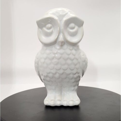 White porcelain owl figurine for home decor and collectible display.